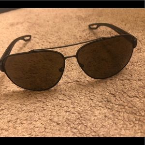 No case... Prada men’s sunglasses.. used.